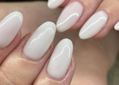 Elegant white manicure at Aesthetics by Kaylee, Mashishing, Mpumalanga, ZA, showcasing expert nail artistry.