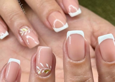 French manicure with floral accents at Aesthetics by Kaylee, Mashishing, Mpumalanga, ZA.