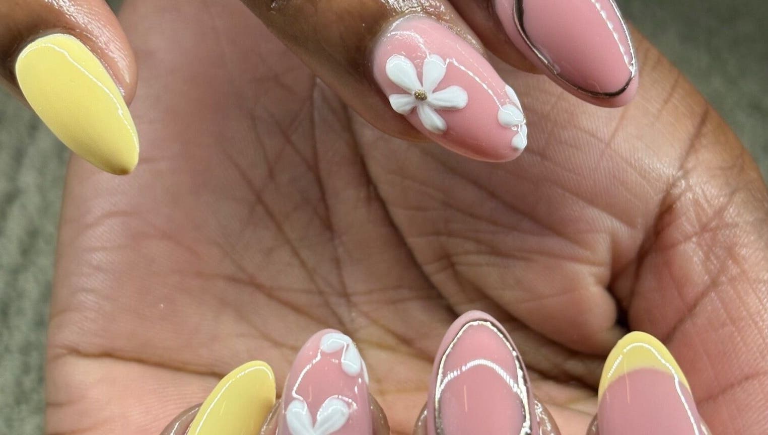 Elegant floral nail art at Aesthetics by Kaylee, Mashishing, Mpumalanga, ZA, showcasing intricate design.