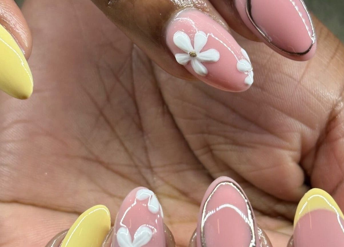 Elegant floral nail art at Aesthetics by Kaylee, Mashishing, Mpumalanga, ZA, showcasing intricate design.