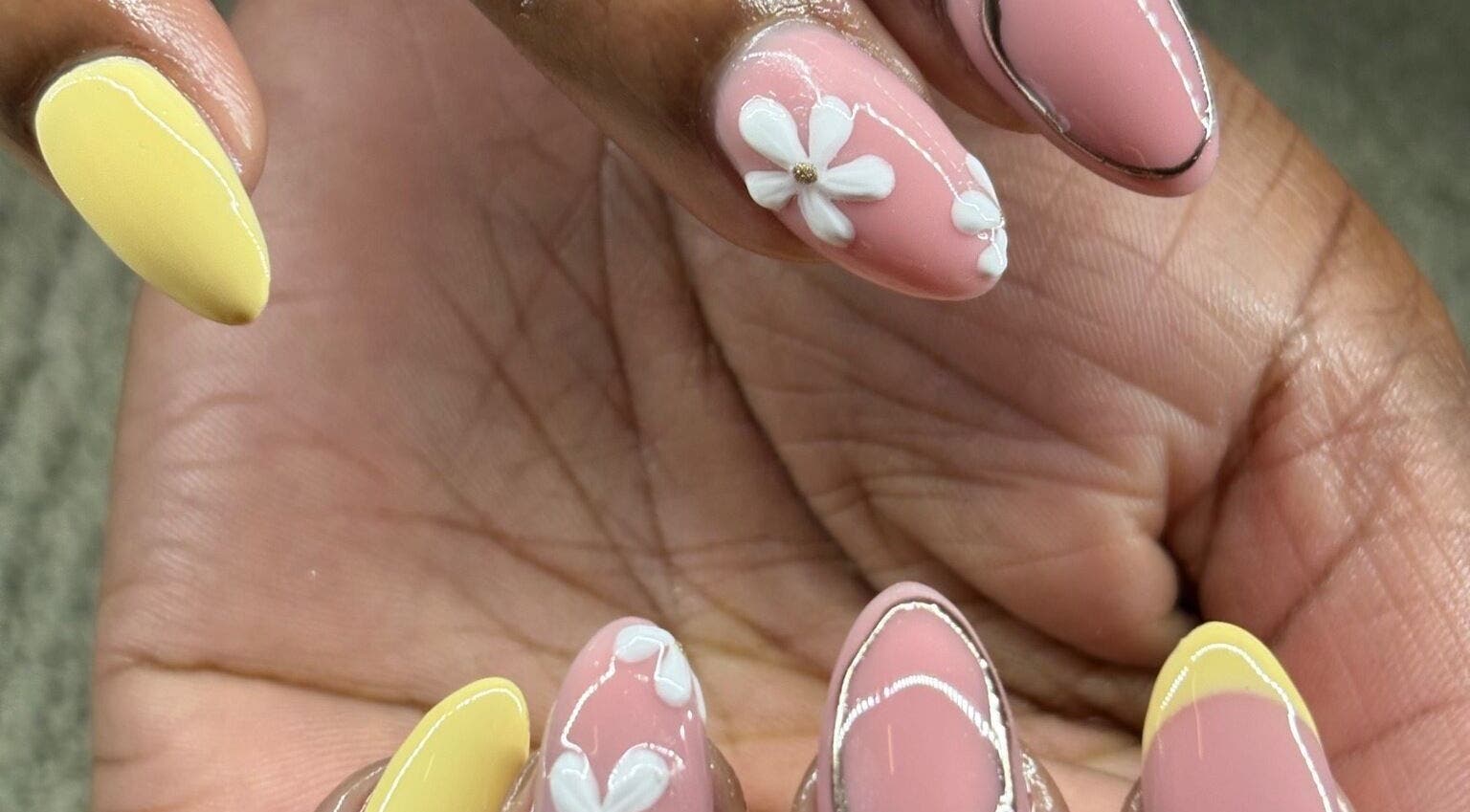 Elegant floral nail art at Aesthetics by Kaylee, Mashishing, Mpumalanga, ZA, showcasing intricate design.