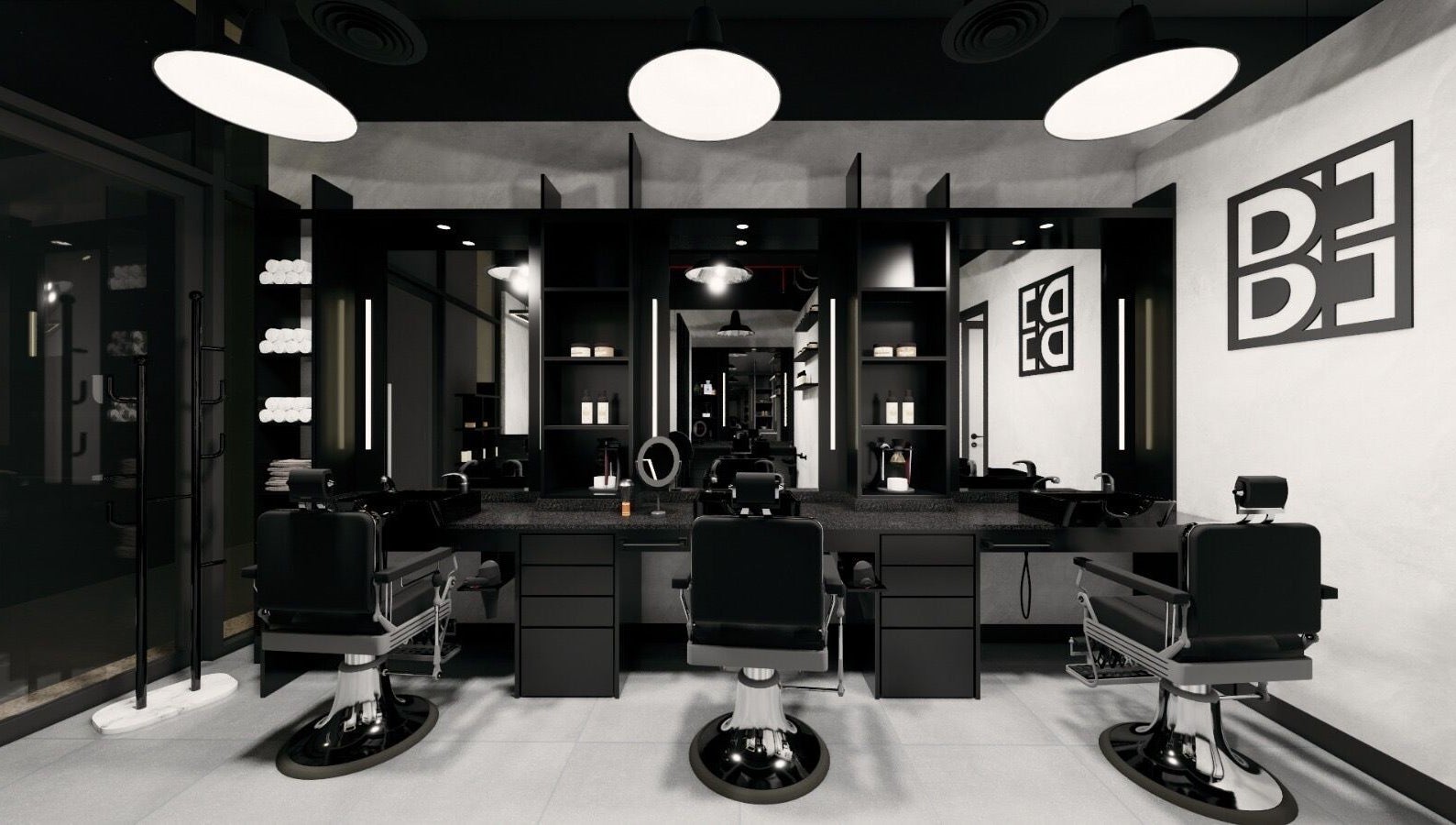 Modern interior of Budz and Broz Barbershop in Dubai, Dubai, AE with sleek black chairs and lit mirrors.