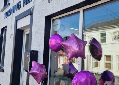 Hand's Up Nail Bar front with purple star balloons, Cork, Ireland, IE.