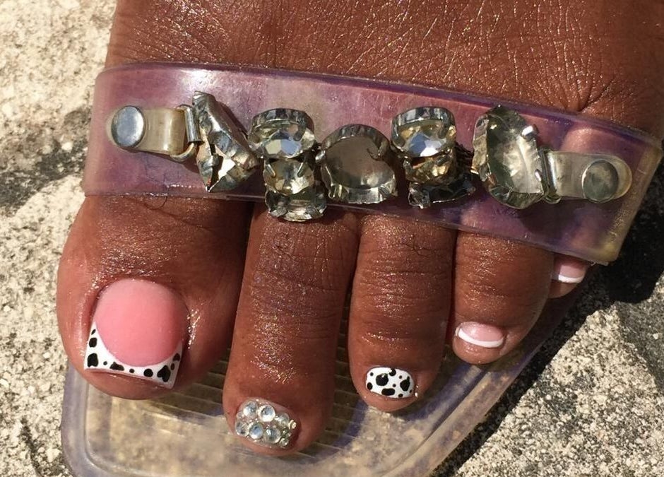 Stylish pedicure at J's fullhousebeauty, Saint Philip, Bridgetown, BB featuring polka-dot design and gems.