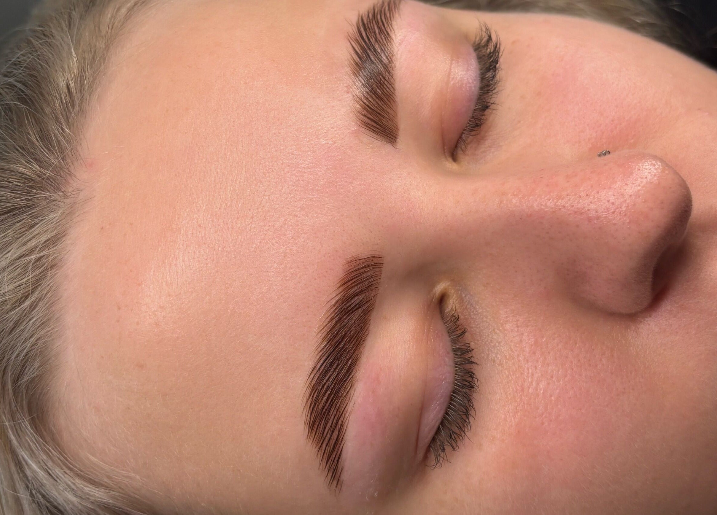 Perfectly groomed brows at TheAngelSalon, Tonbridge, England, GB showcasing expert beauty techniques.