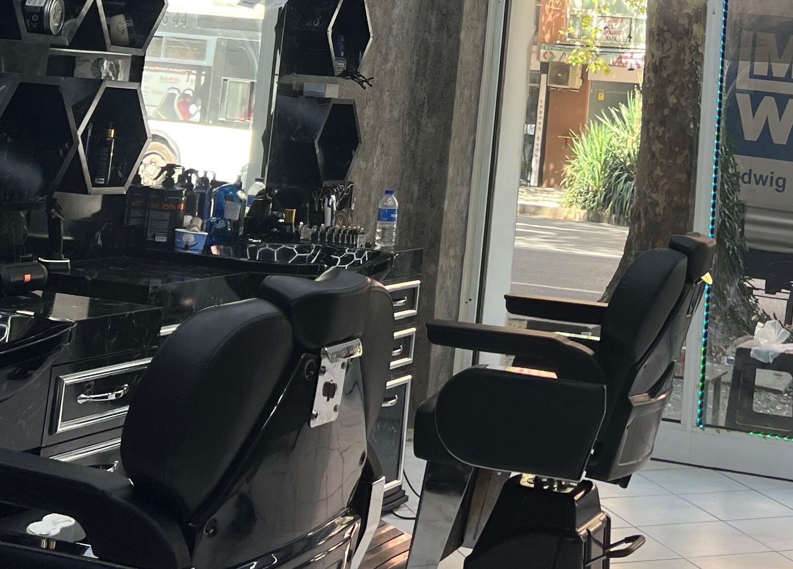 Modern barber chairs and grooming tools at Meshari Barbers, Plovdiv, Plovdiv, BG.