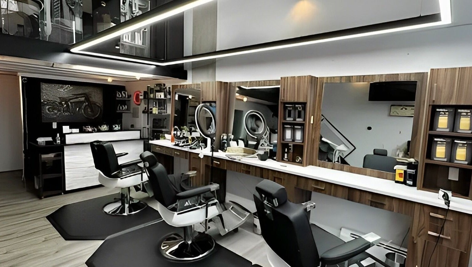 Modern interior of Ev Cut Barbershop in Calgary, Alberta, CA with stylish chairs and mirrors.