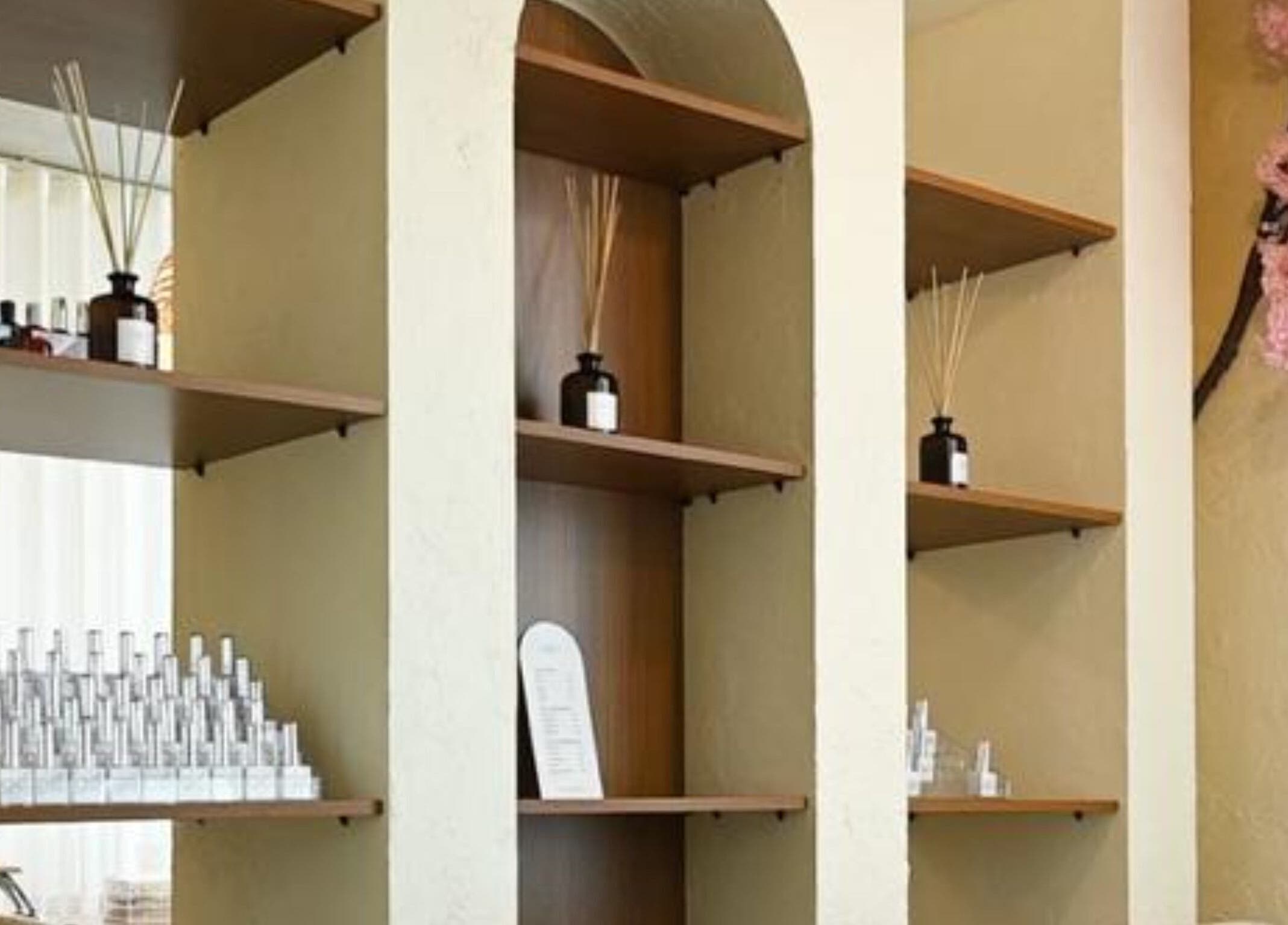 Elegant shelving with decor at LW Nail Bar, Riyadh, Riyadh Province, SA. Aesthetic beauty and wellness ambiance.
