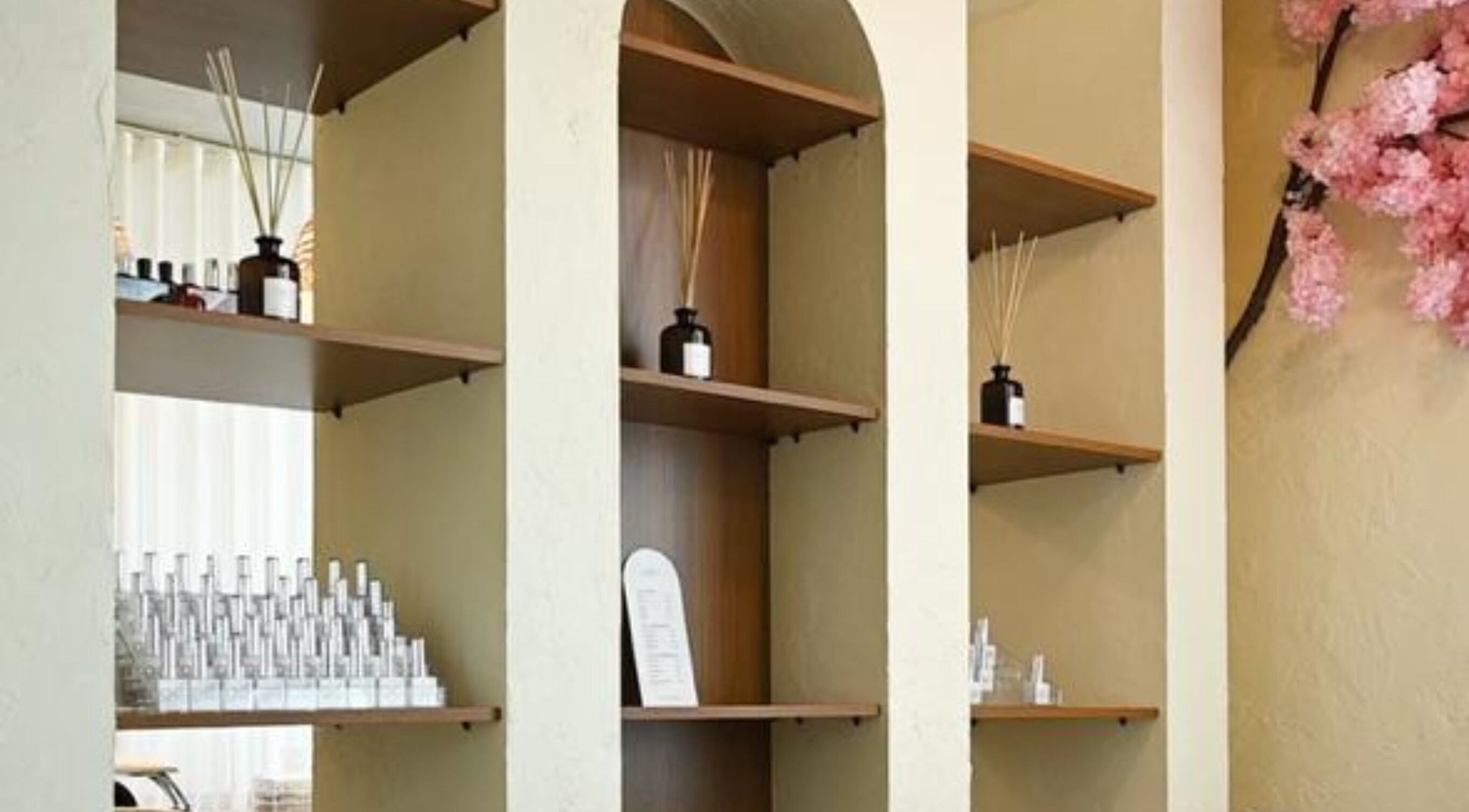 Elegant shelving with decor at LW Nail Bar, Riyadh, Riyadh Province, SA. Aesthetic beauty and wellness ambiance.