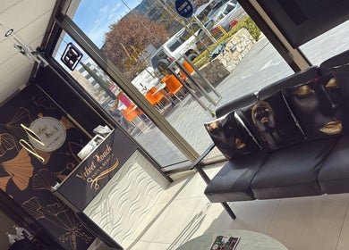 Cozy reception at Velvet Touch Hair & Beauty, Barton, AU, with stylish decor and seating.