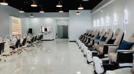 Modern interior of T & S Nails in Westfield, Indiana, featuring stylish pedicure chairs and elegant design.