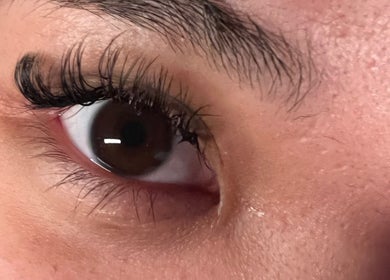 Close-up of eyelash extensions from Eye Candy Lashes in Barrie, Ontario, CA showcasing natural beauty.