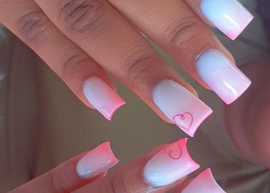 Elegant pink ombre nails with heart design at Sassy Tips by Sab, Spanish Town, St. Catherine Parish, JM.