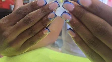 Blue-tipped nails expertly designed at Sassy Tips by Sab, Spanish Town, St. Catherine Parish, JM.
