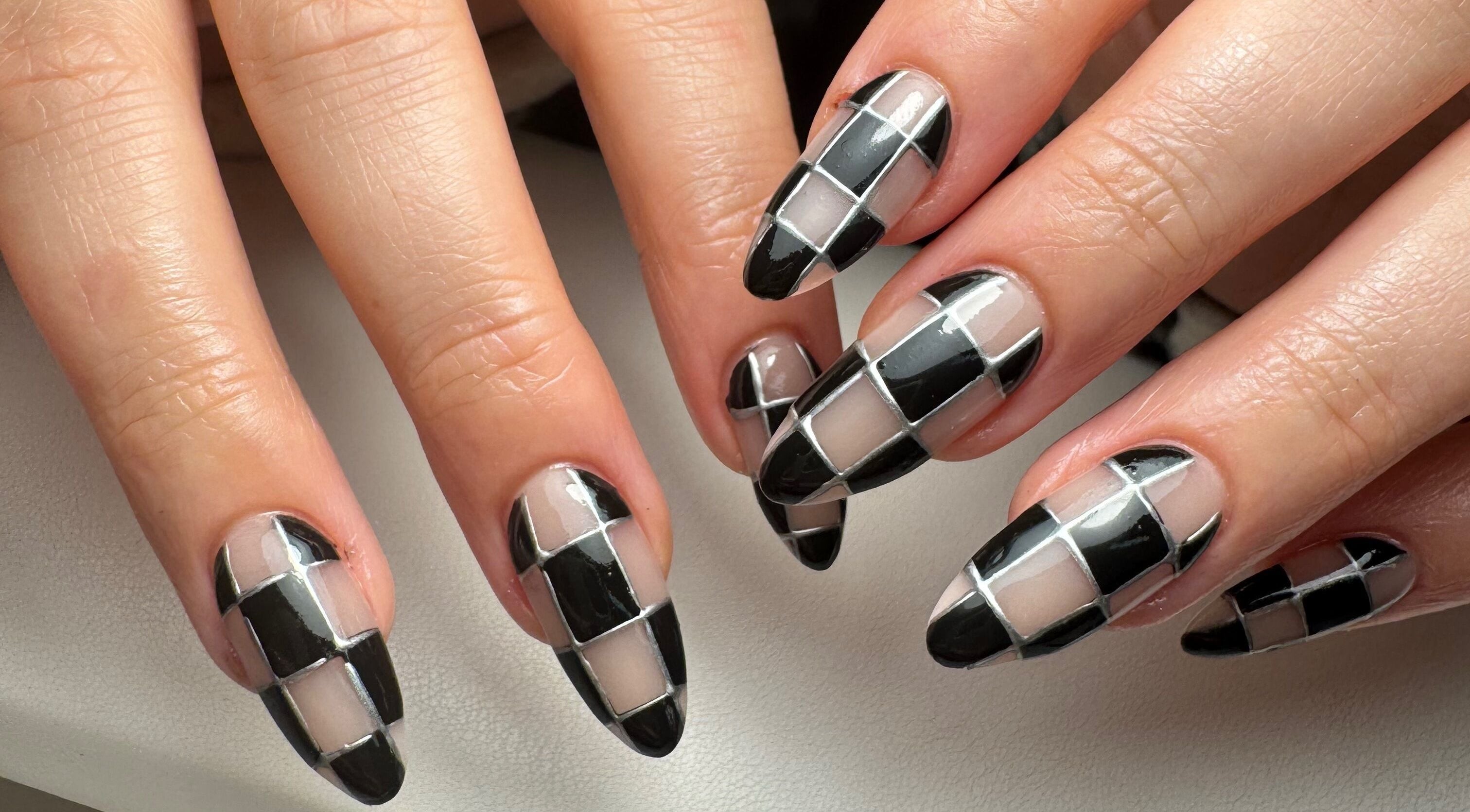 Stylish black and white geometric nails at Nats Nails, O’Hair Salon, Stevenston, Scotland, GB.