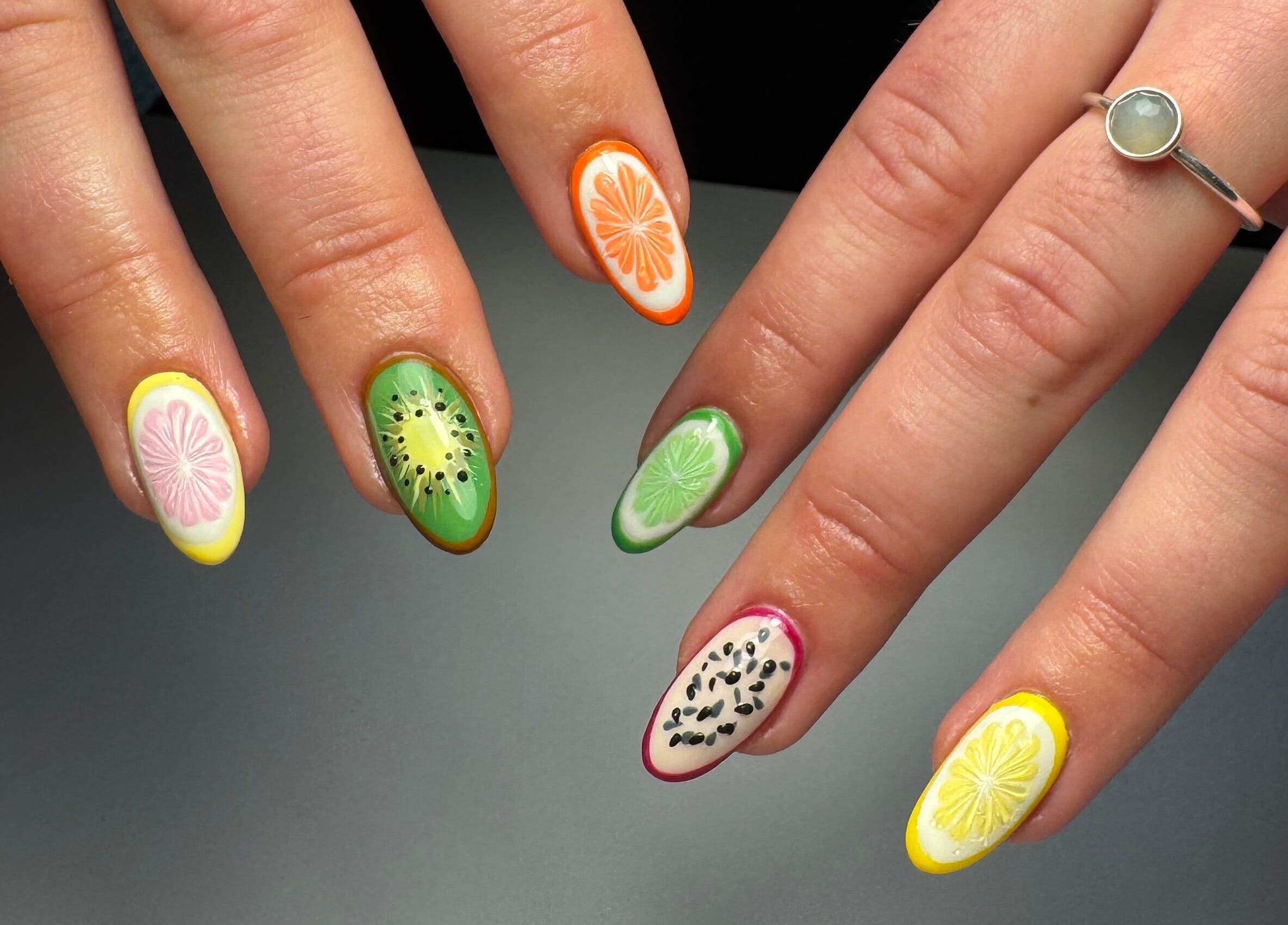 Vibrant fruit-themed nail art by Nats Nails, O’Hair Salon, located in Stevenston, Scotland, GB.