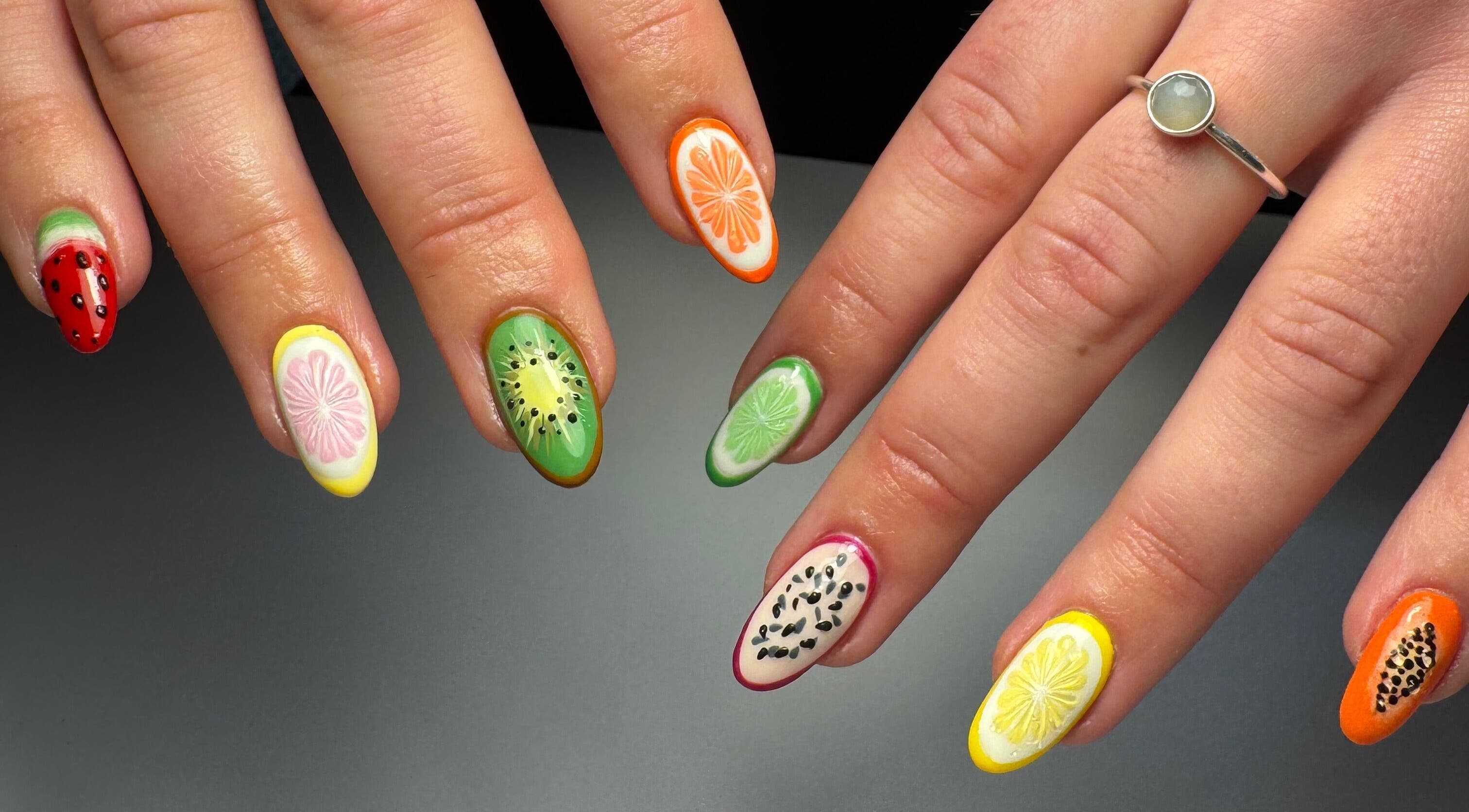Vibrant fruit-themed nail art by Nats Nails, O’Hair Salon, located in Stevenston, Scotland, GB.