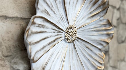 Artistic floral wall decor at Sker Hair Salon in Cape Town, Western Cape, ZA enhancing ambiance.