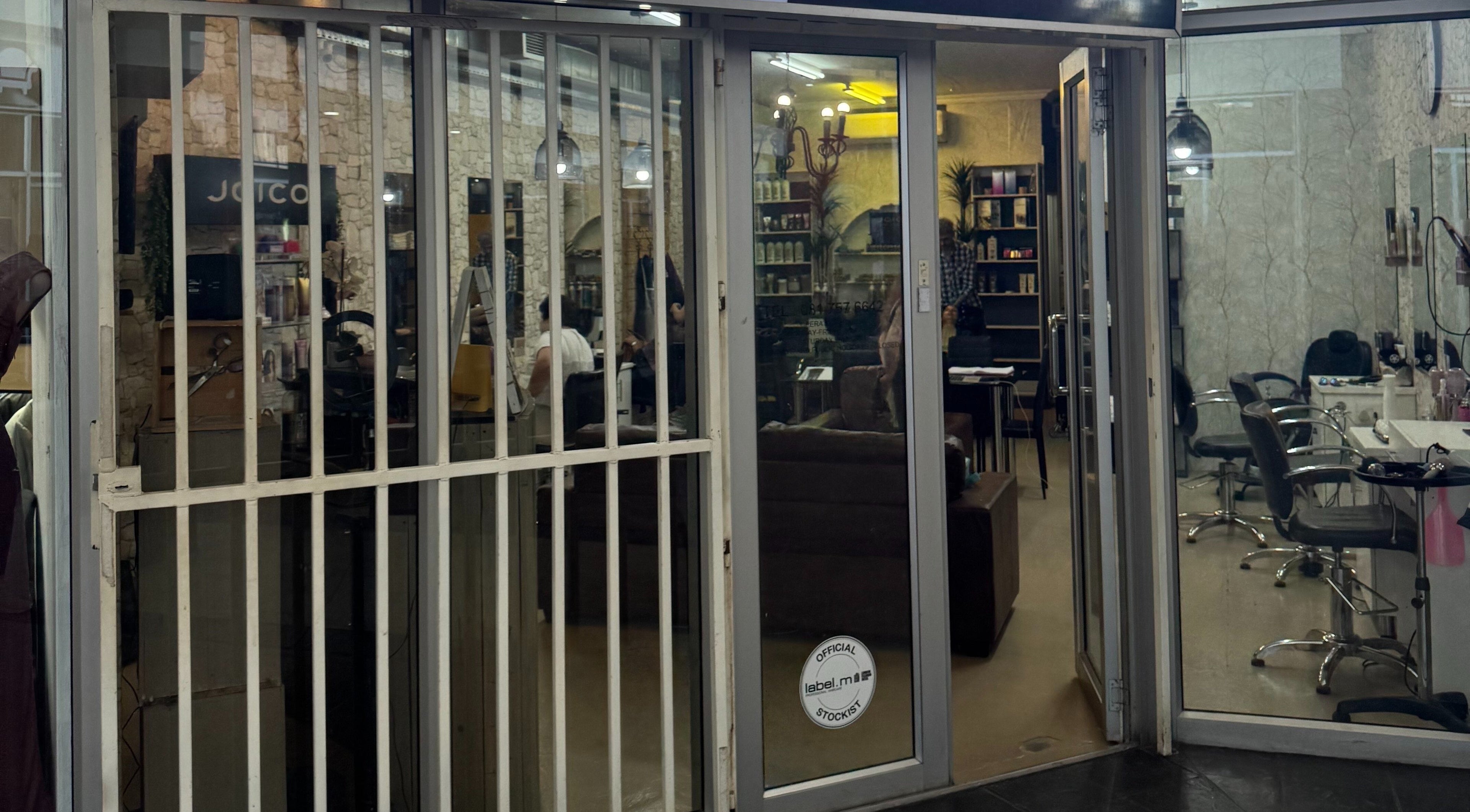 Entrance of Sker Hair Salon in Cape Town, Western Cape, ZA showcasing a stylish and inviting interior.