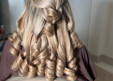 Elegant cascading curls styled at Hair by Hannah in Blackpool, England, GB showcasing expert hairstyling.