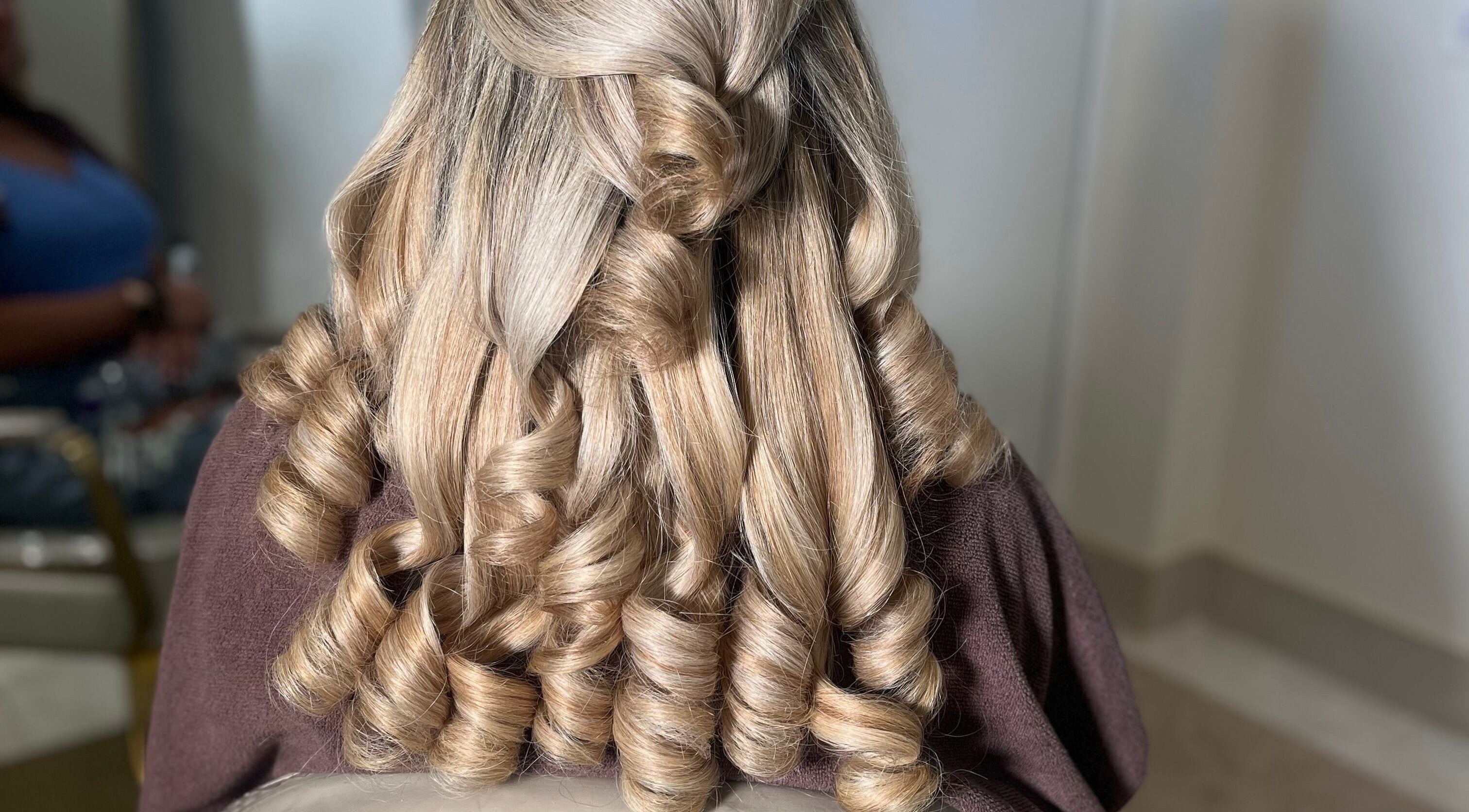 Elegant cascading curls styled at Hair by Hannah in Blackpool, England, GB showcasing expert hairstyling.