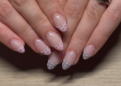 Chic polka dot nail design at ClawsbyChlo, Great Notley, England, GB.