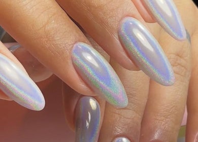 Iridescent nails at Nailful Salon, Jeddah, Makkah Province, SA, showcasing luxurious manicure.