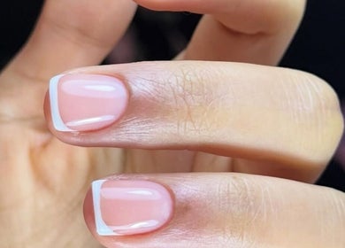 Elegant French manicure at Nailful Salon, Jeddah, Makkah Province, SA, showcasing refined nail artistry.