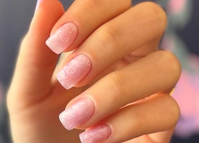 Close-up of elegant pink manicure at Nailful Salon, Jeddah, Makkah Province, SA.