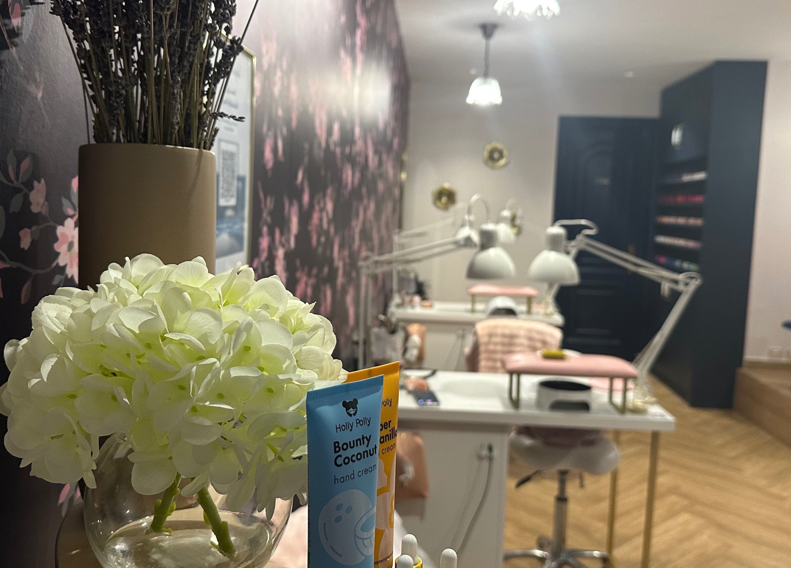 Elegant interior of Nailful Salon in Jeddah, Makkah Province, SA with chic decor and modern nail stations.
