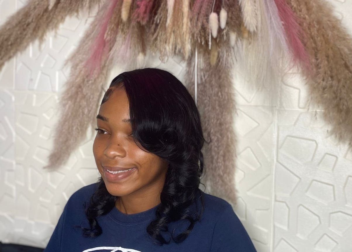 Elegant hairstyle at Styles By Kera, Roseau, Saint George Parish, DM showcasing modern beauty.