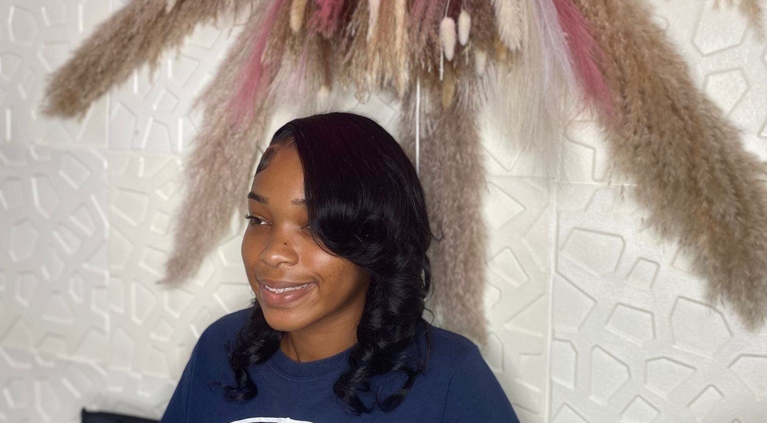 Elegant hairstyle at Styles By Kera, Roseau, Saint George Parish, DM showcasing modern beauty.