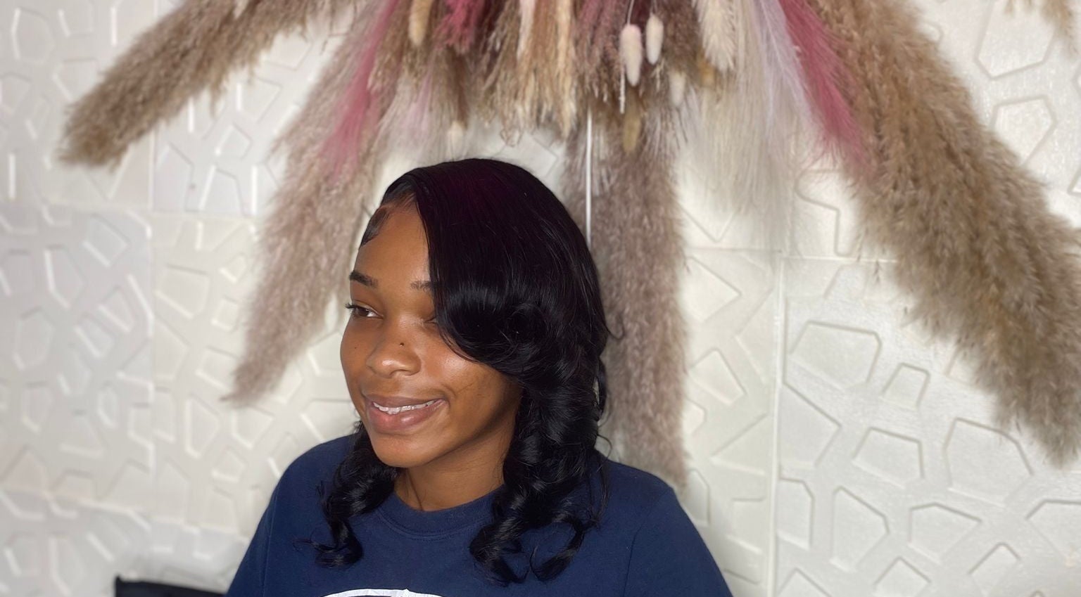 Elegant hairstyle at Styles By Kera, Roseau, Saint George Parish, DM showcasing modern beauty.