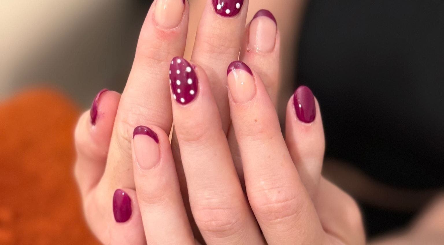 Stylish purple manicure with polka dots at Nails By El, Thurmaston, England, GB.