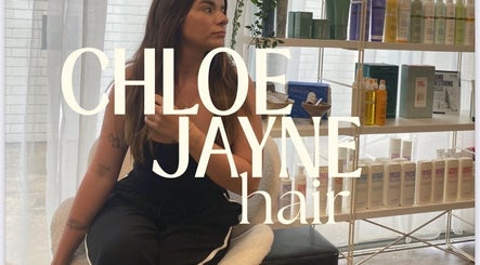 Modern interior of Chloe Jayne Hair in Tweed Heads, Queensland, AU showcasing sleek design and product display.