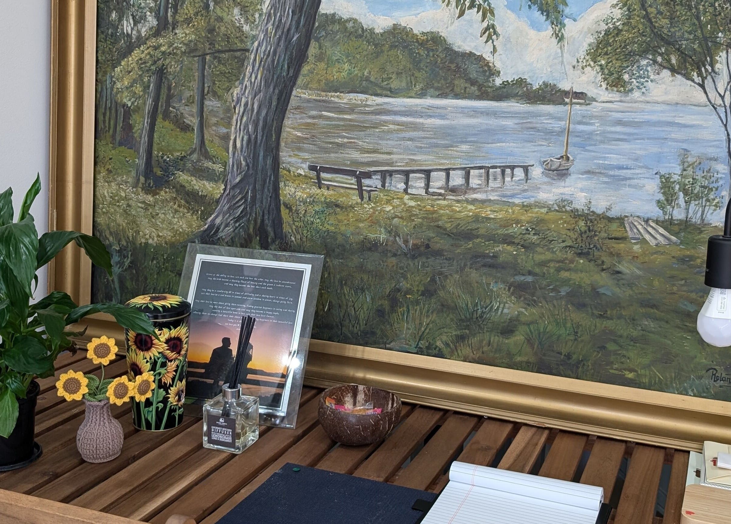 Relaxing desk setup at Tokyo Eyelash, Kilburn, South Australia, AU with peaceful paintings and plants.