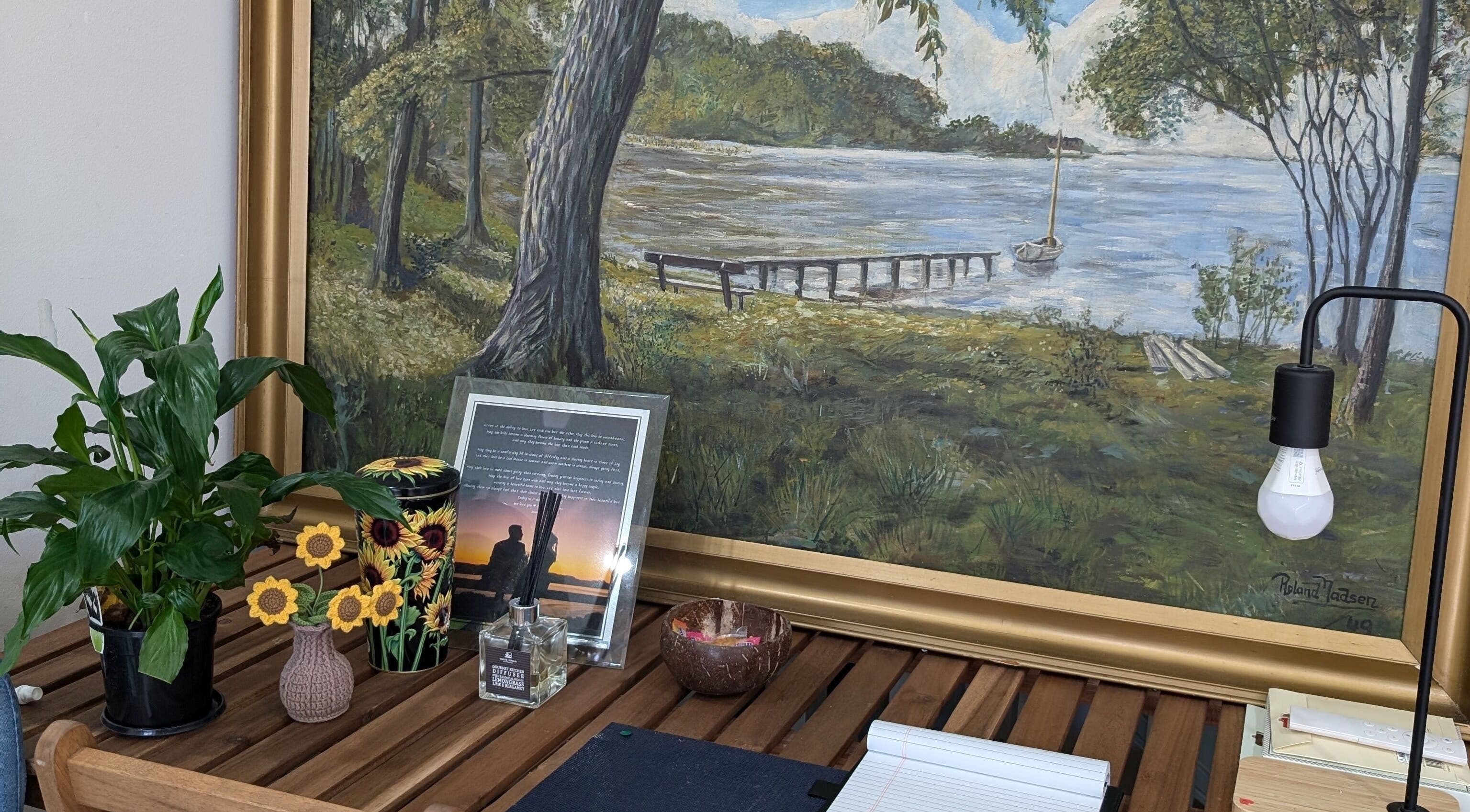 Relaxing desk setup at Tokyo Eyelash, Kilburn, South Australia, AU with peaceful paintings and plants.