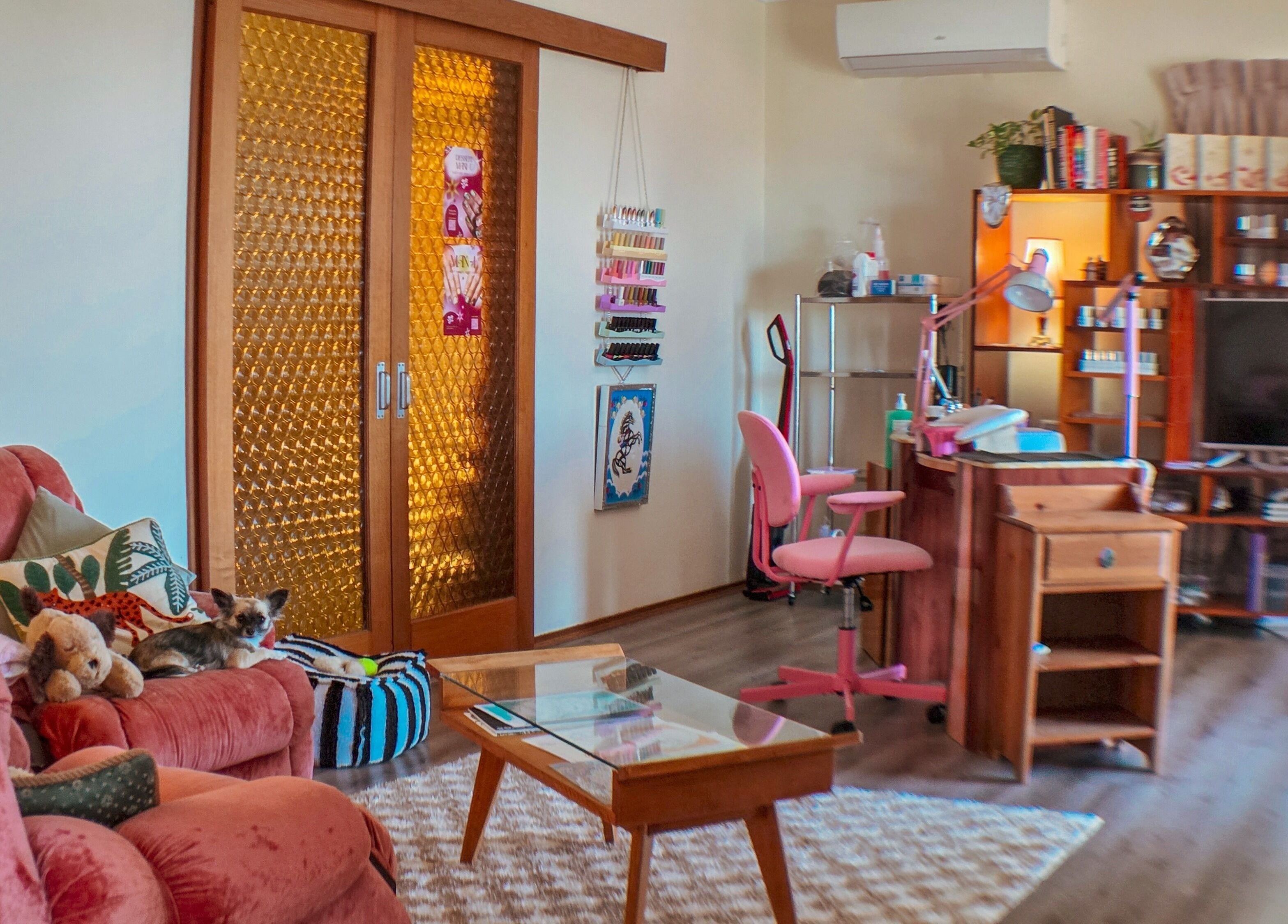 Relaxing beauty space at Gelli Jam in Burswood, Western Australia, AU with plush seating and nail polish display.