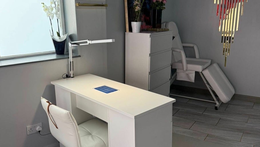 Elegant nail station at Hellhouse salon, Norwich, England, GB, highlighting modern white decor.