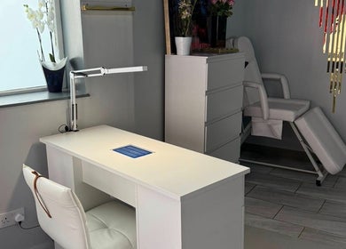 Elegant nail station at Hellhouse salon, Norwich, England, GB, highlighting modern white decor.