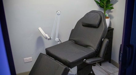 Luxurious treatment chair at Hellhouse Salon, Norwich, England, GB, ready for clients.
