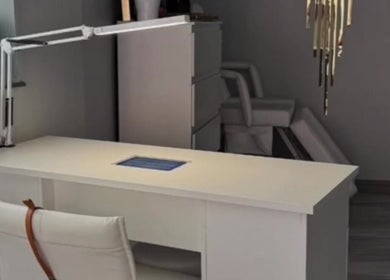 Modern workspace at Hellhouse Salon, Norwich, England, GB. Minimalist design with white desk and chair.