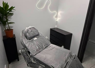 Tranquil treatment room at Hellhouse salon, Norwich, England, GB with modern decor and relaxing ambiance.