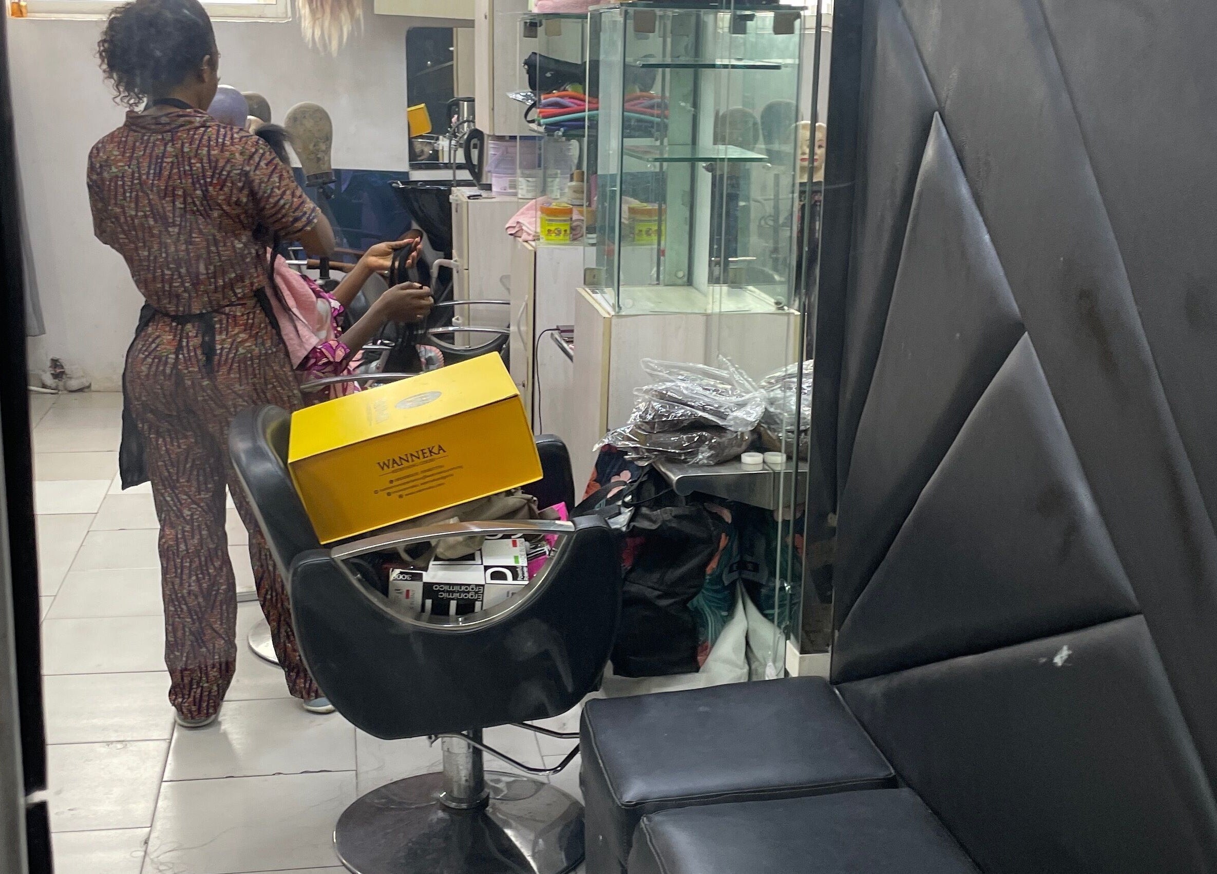 HairByTreapotter salon in Lagos, Lagos, NG showcasing vibrant, stylish hair services.