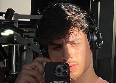 Person with headphones at Mustafa cuts, Sala Al Jadida, Rabat-salé-kénitra, MA.