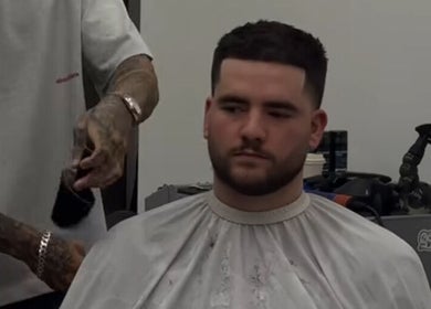 Client at Mustafa Cuts in Sala Al Jadida, Rabat-salé-kénitra, MA receiving a precise haircut.