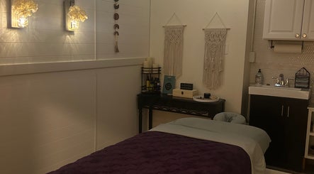 Serene massage room at Soul Craft Coaching & Wellness, Lapeer, Michigan, US, featuring calming decor.