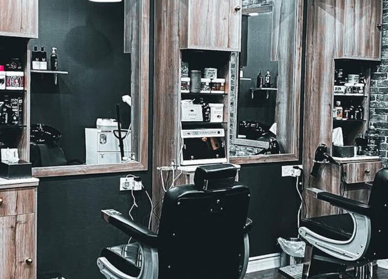 Modern salon chairs and styling area at Classy Salon, Ajman, Ajman, AE, showcasing a stylish interior.