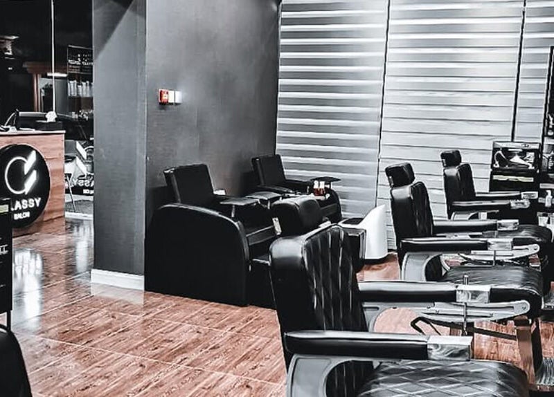 Elegant salon chairs and interior at Classy Salon, Ajman, Ajman, AE enhancing beauty experience.
