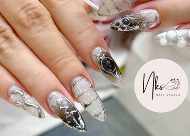 Intricate silver and white 3D nail art design at Nails By Nks, Phnom Penh, Phnom Penh, KH.